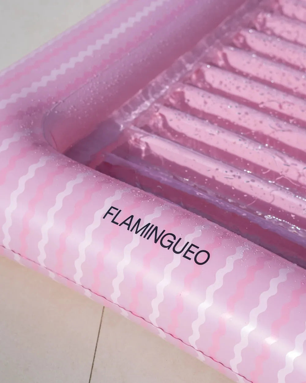 Tumbona hinchable rosa de uso individual