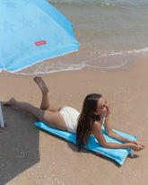 respaldo playa con bolsillo trasero