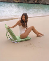 silla de playa verde flamingueo