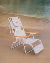 silla playa con reposabrazos y agujero para la cabeza