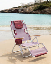 silla playa con reposabrazos y agujero para la cabeza