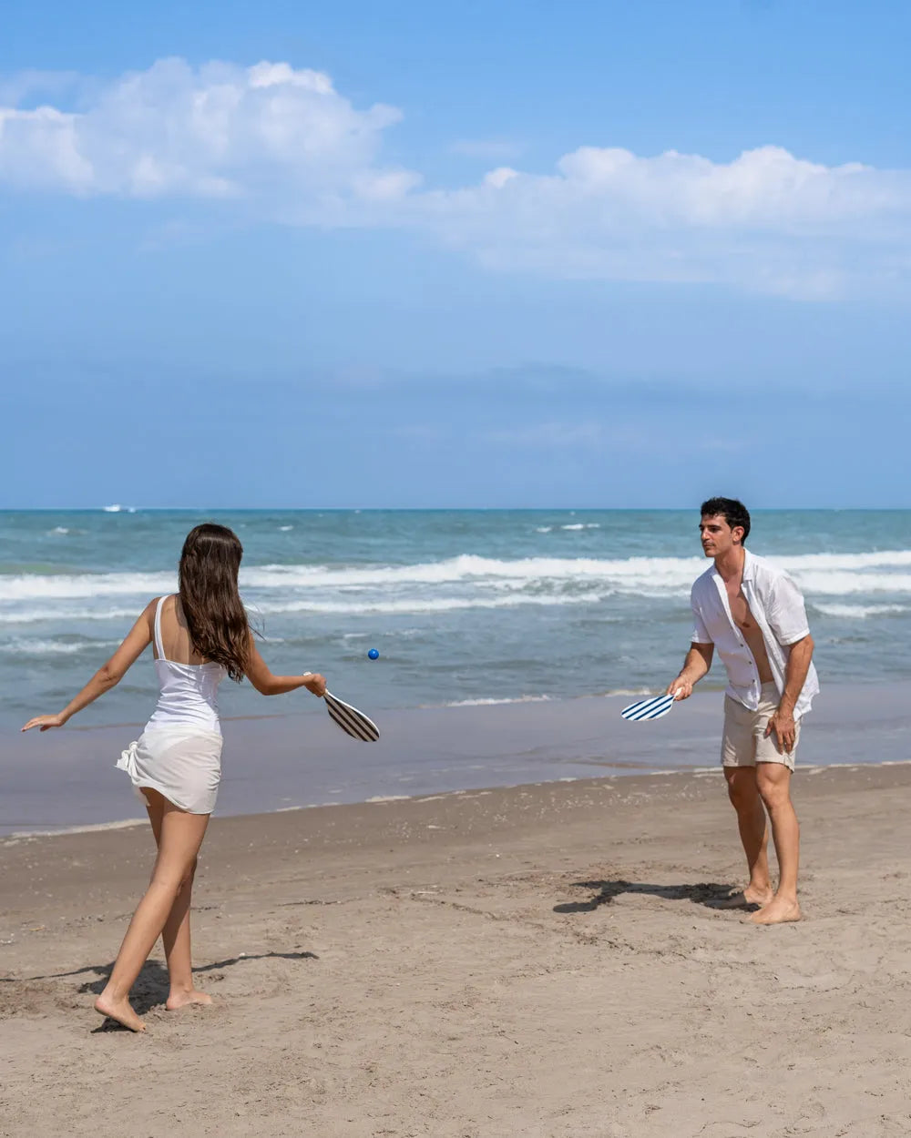 Palas de madera para jugar en la playa