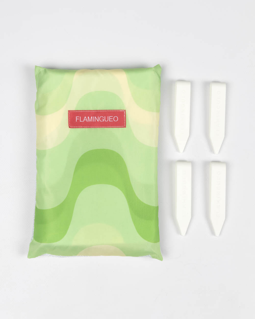 funda a juego para guardar la toalla