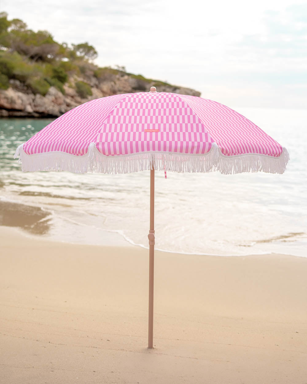 sombrilla rosa flamingueo playa
